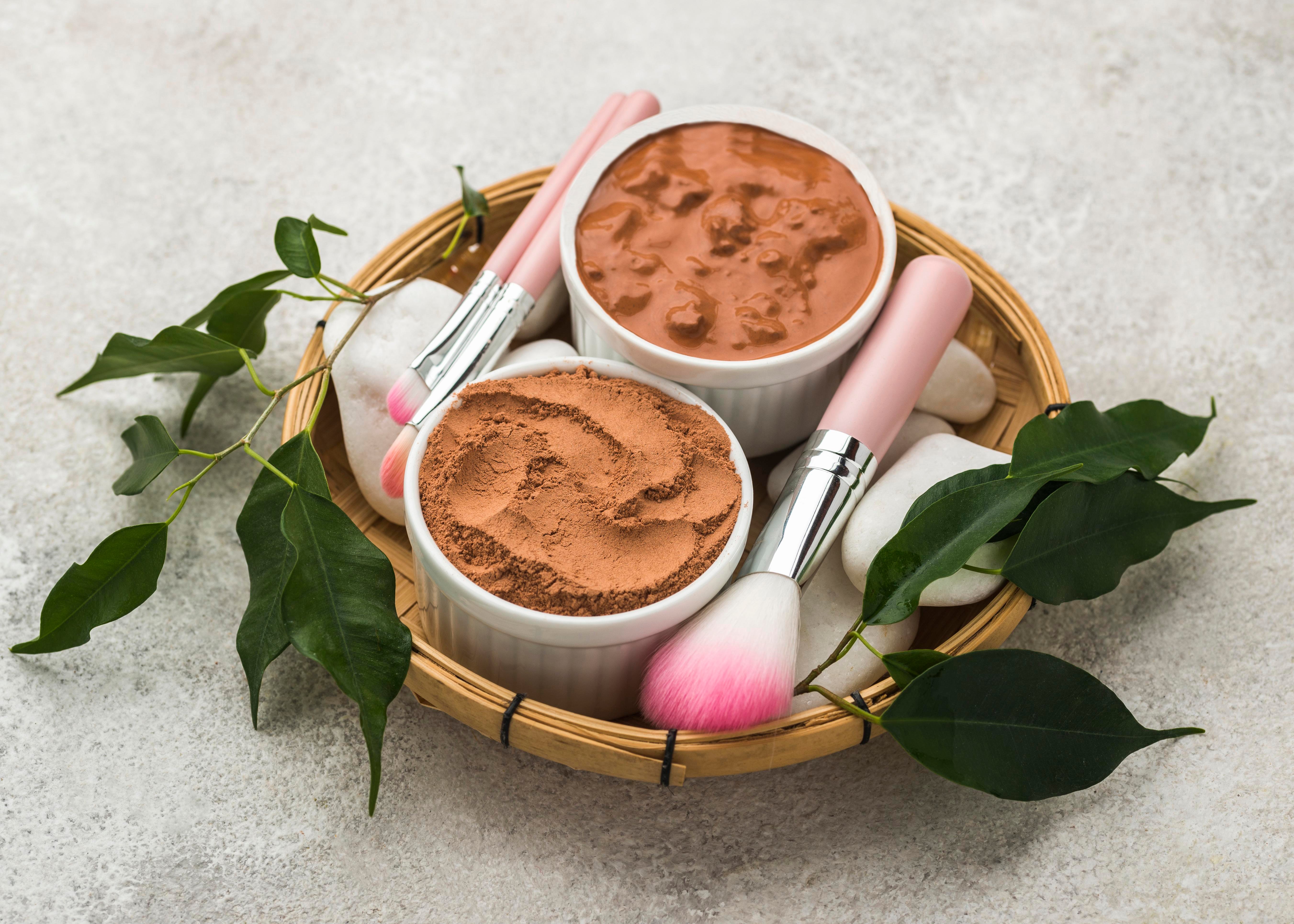 high-angle-fine-powder-bowls-with-brushes-leaves